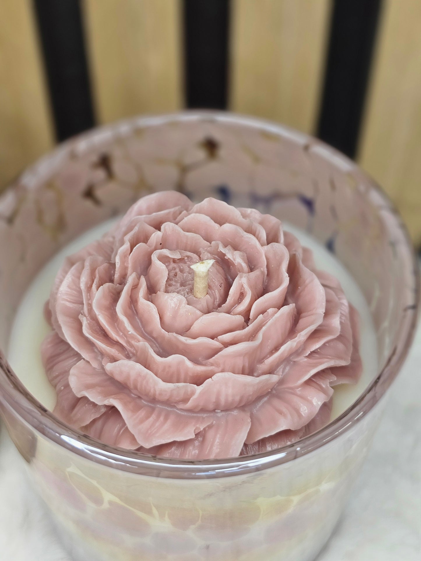 Candle in the handmade glass pot